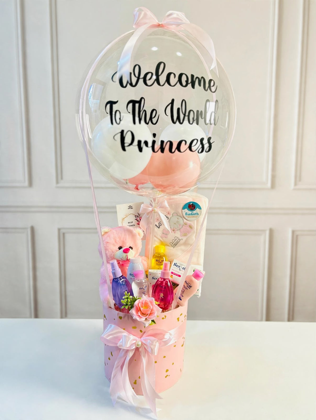 Welcome Baby Princess gift box with personalized bubble balloon, pink teddy bear, and baby care essentials