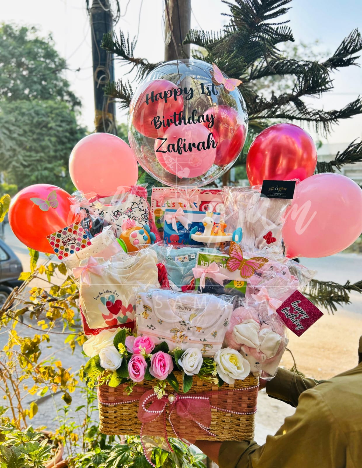 Luxury 1st birthday baby girl gift basket with personalized bubble balloon, toys, clothes and balloons