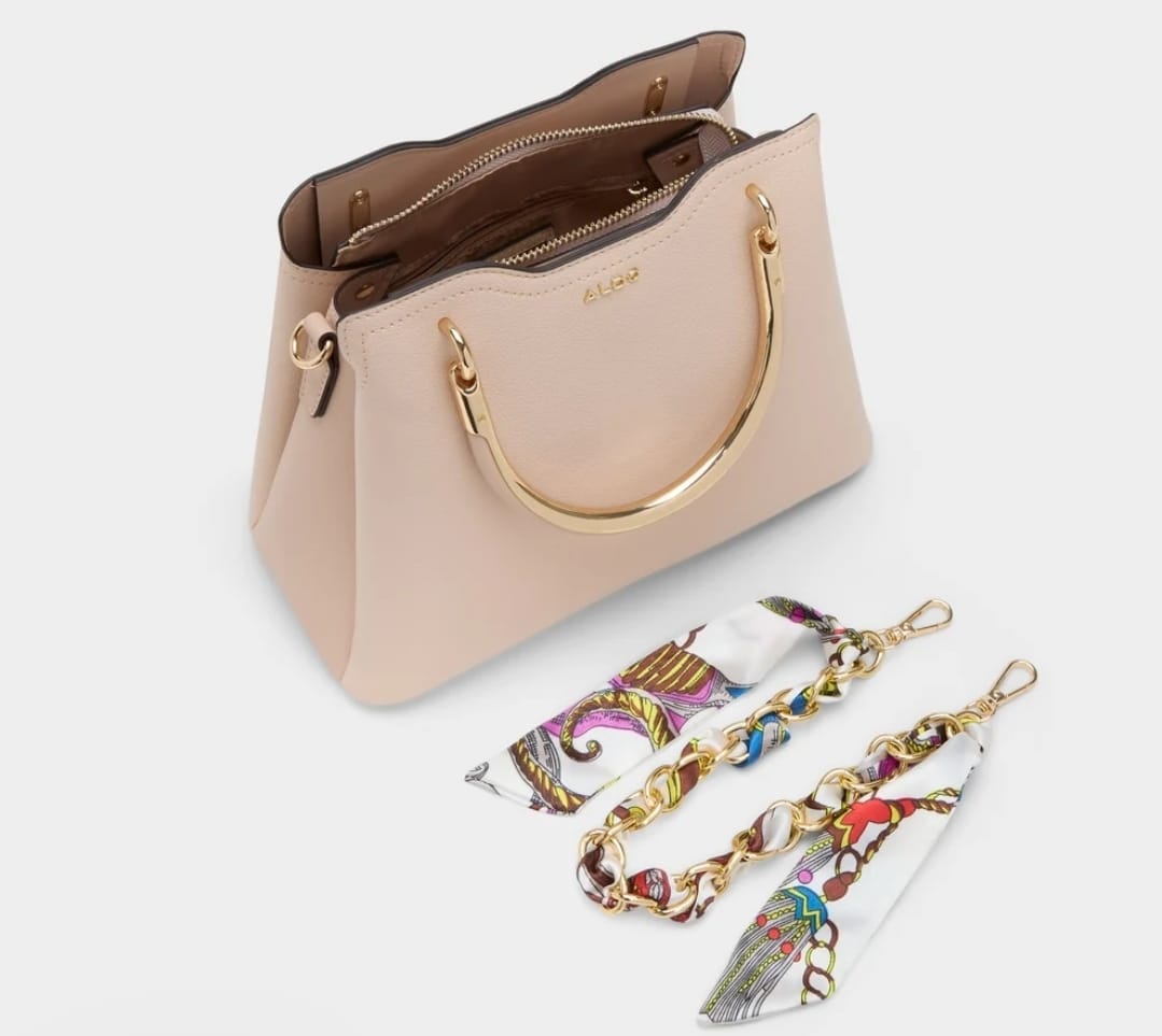 ALDO beige shoulder bag with gold hardware and decorative scarf