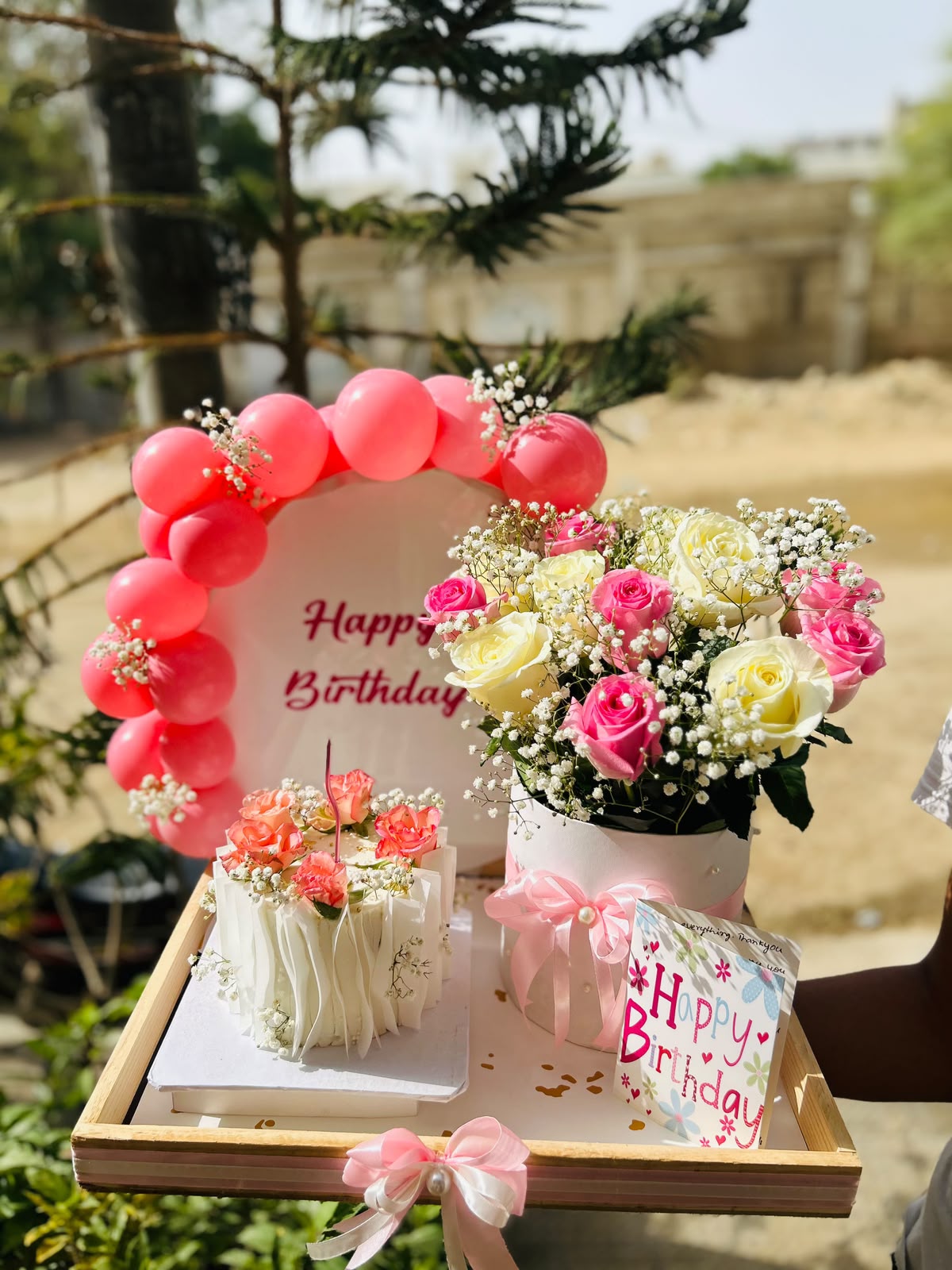 Birthday flower bouquet and cake gift tray with pink balloons