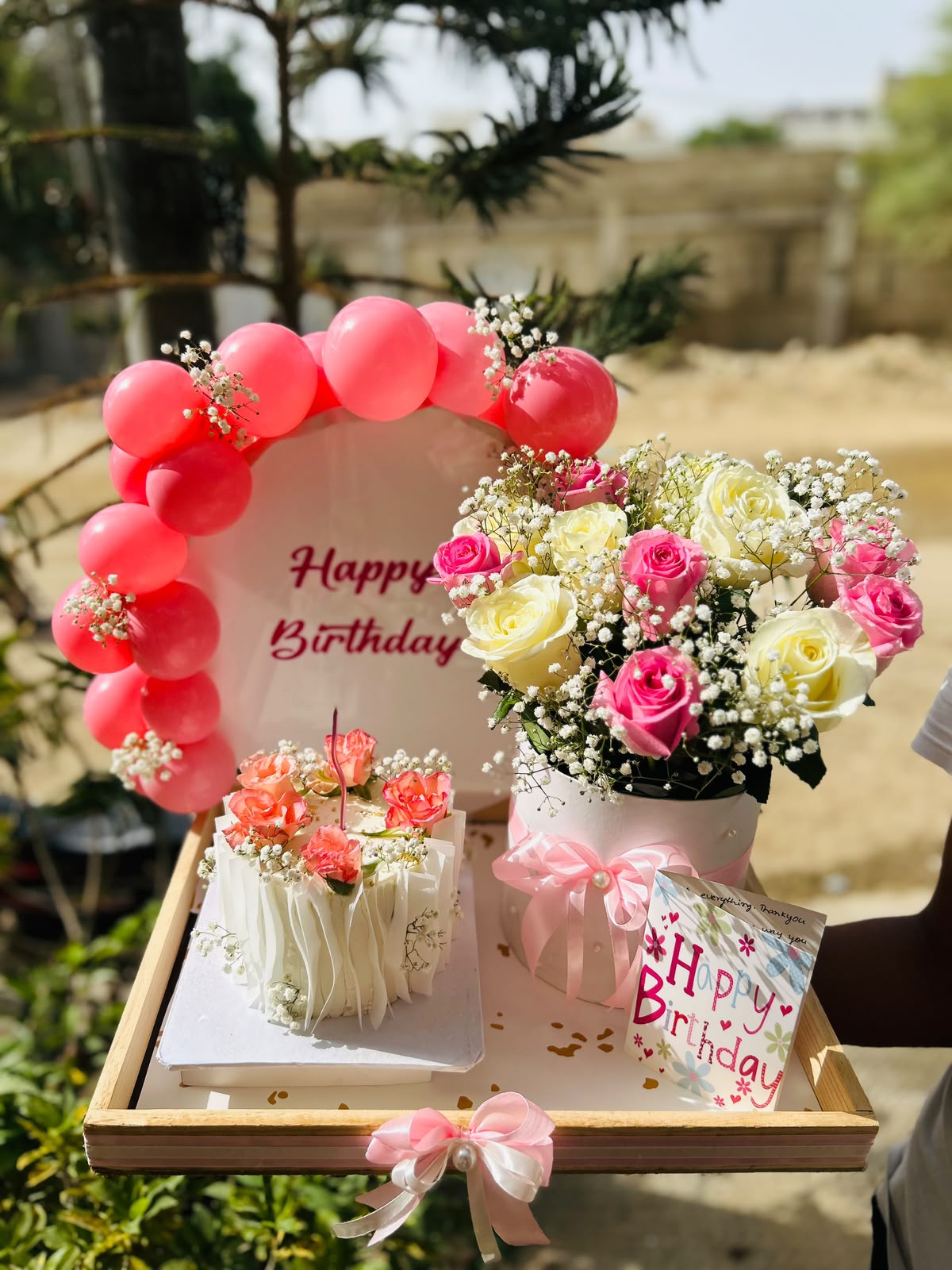 Birthday flower bouquet and cake gift tray with pink balloons