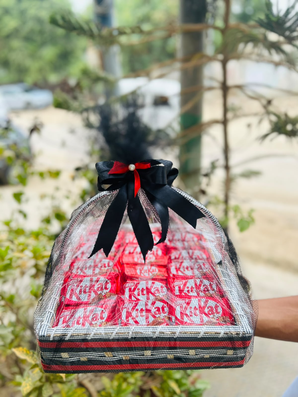 KitKat chocolate gift basket with black and red wrapping