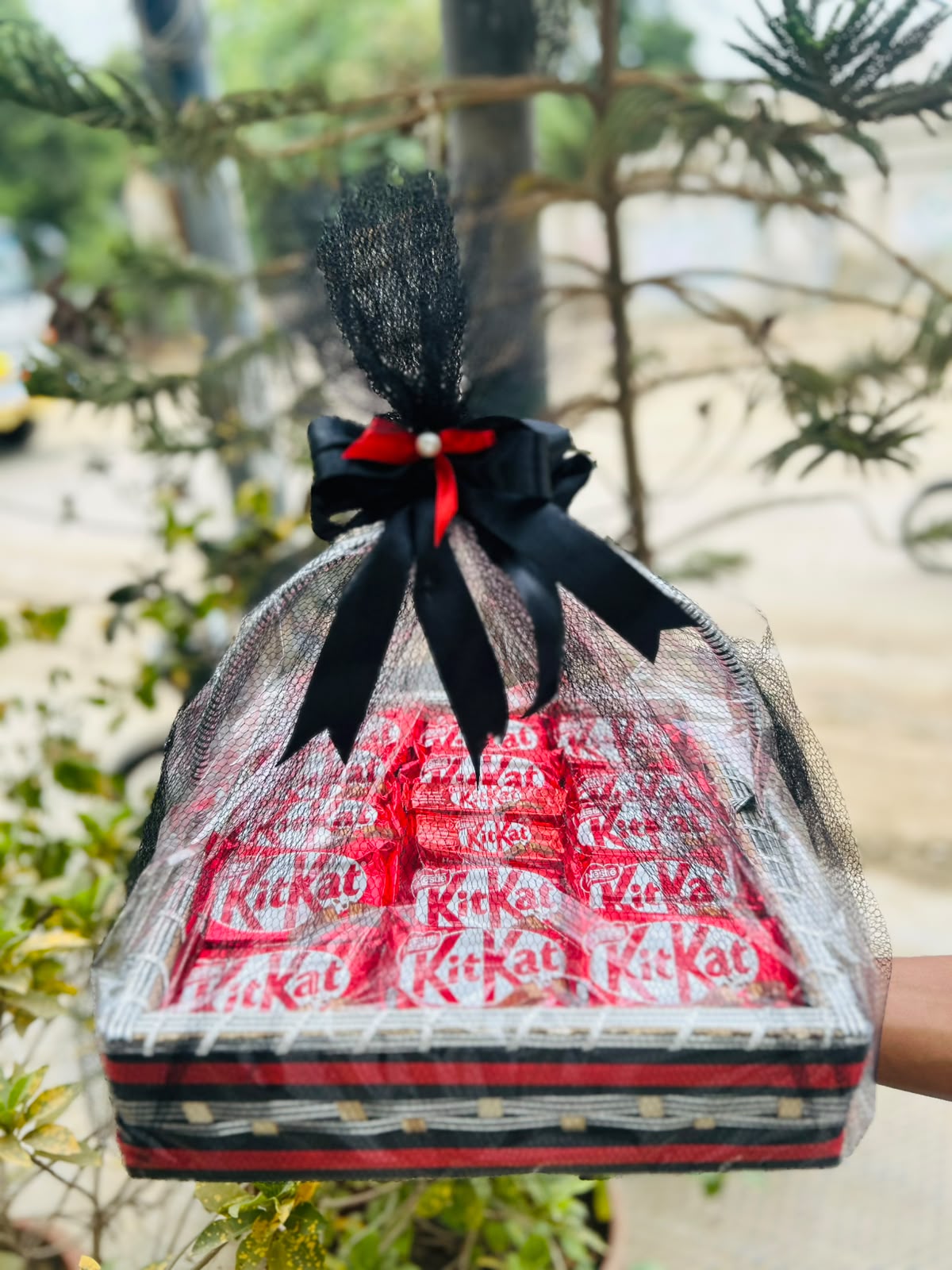 KitKat chocolate gift basket with black and red wrapping