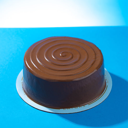 Layers Hershey's Chocolate Cake with rich Hershey's chocolate frosting available for same-day delivery in Lahore and Islamabad from Giftogram by Samana.