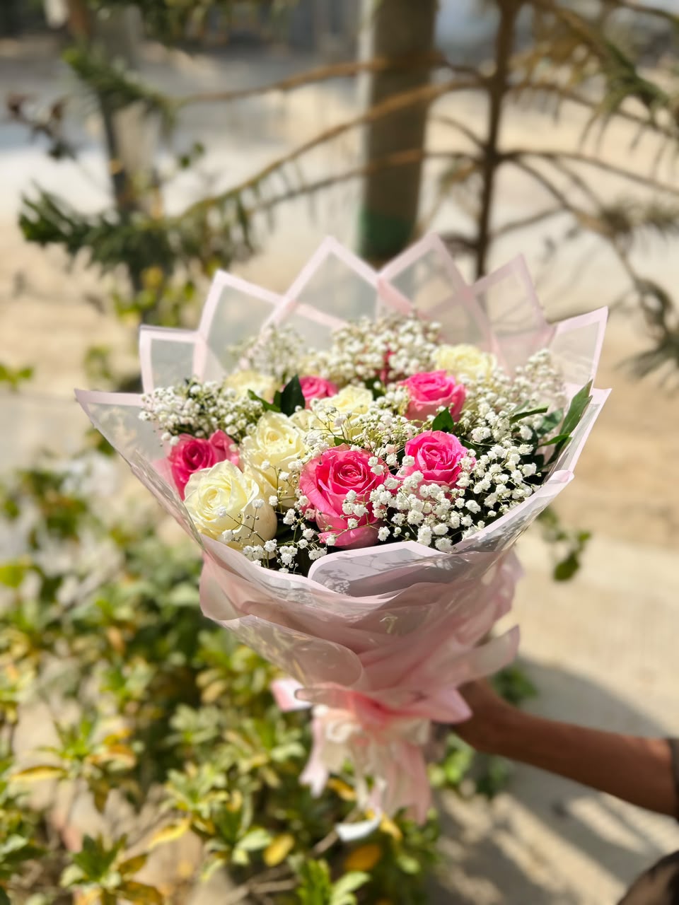 Love in Bloom bouquet with 10 imported roses and Baby’s Breath