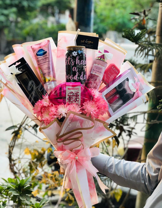 Makeup Bouquet Gift with Beauty Products, Pink Wrapping & Flowers