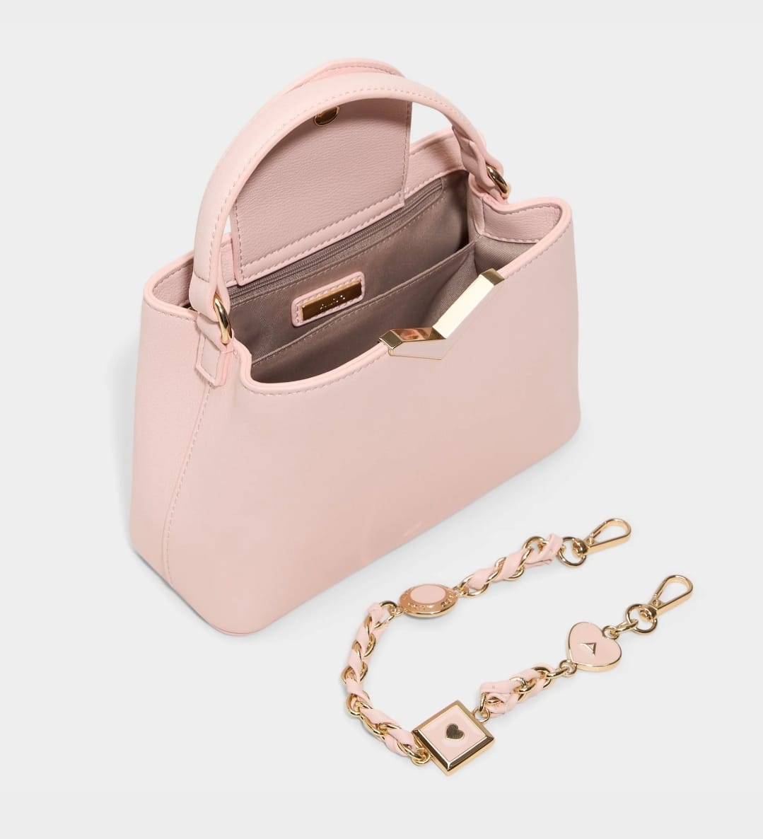 Pink shoulder handbag with gold chain and heart details