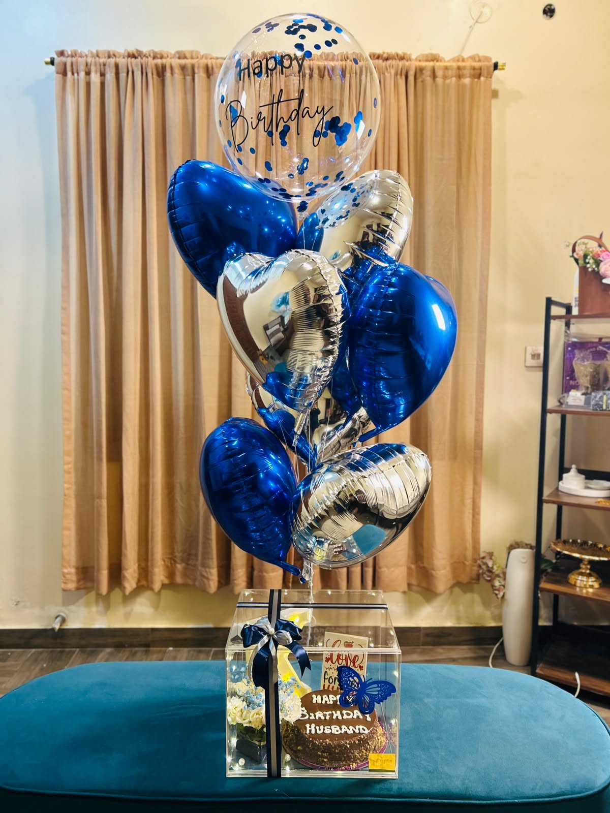 Blue and silver birthday balloon bouquet with cake gift box