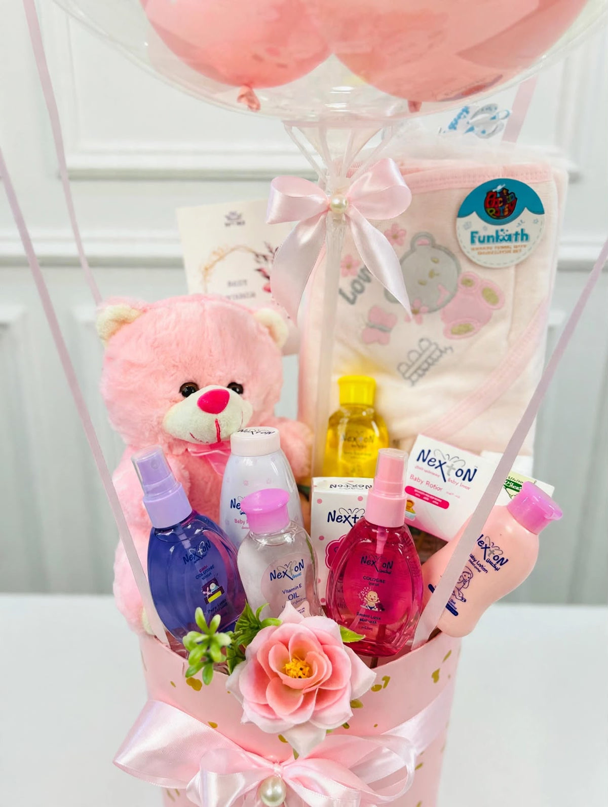 Welcome Baby Princess gift box with personalized bubble balloon, pink teddy bear, and baby care essentials