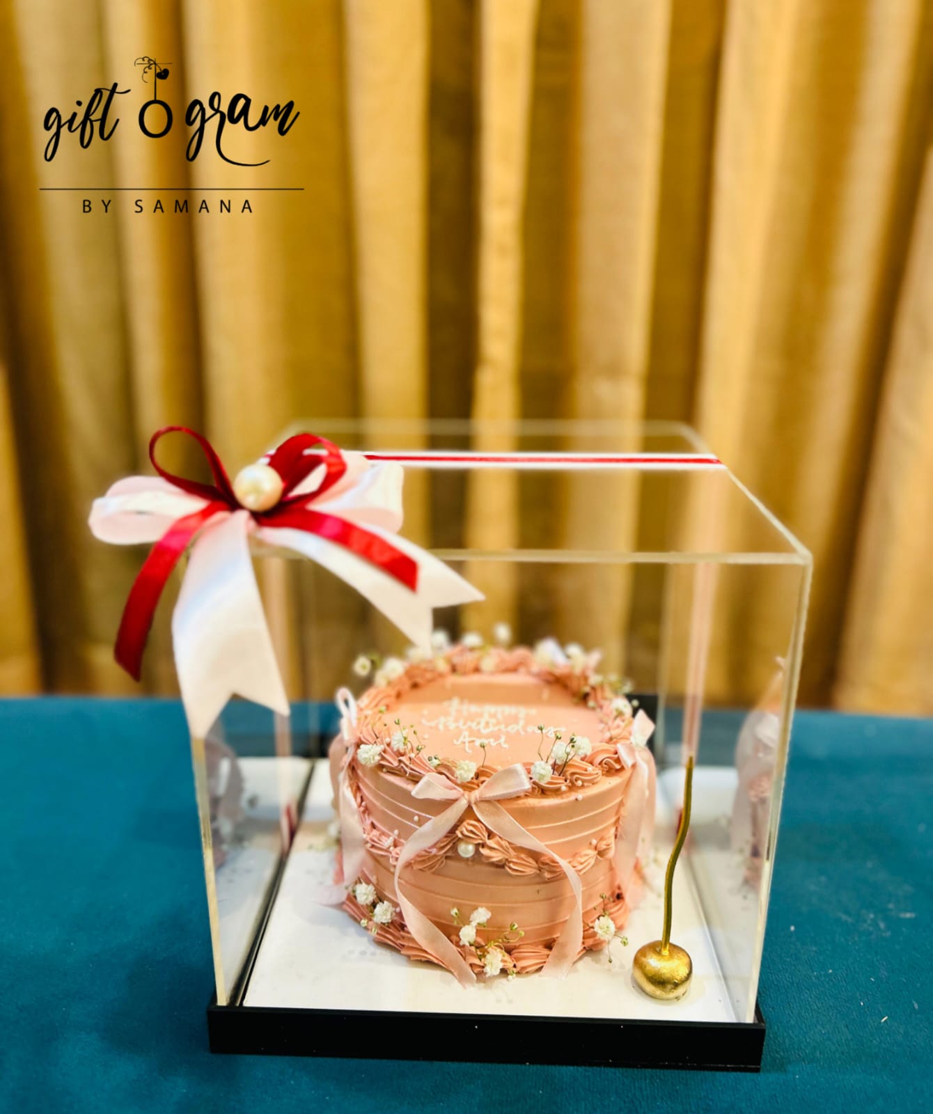Luxury mini cake in transparent gift box with ribbon