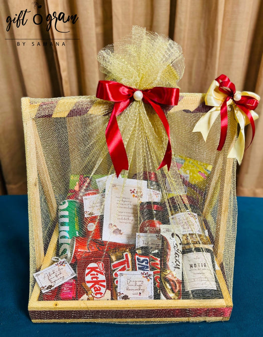 Luxury chocolate and snack hamper gift box with assorted treats