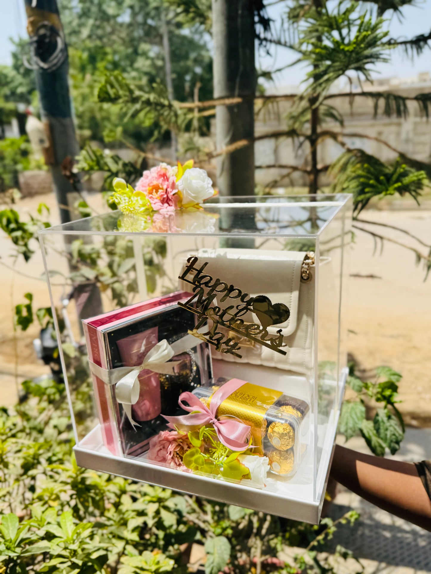 Designer handbag in acrylic luxury gift box for Mother’s Day Pakistan
