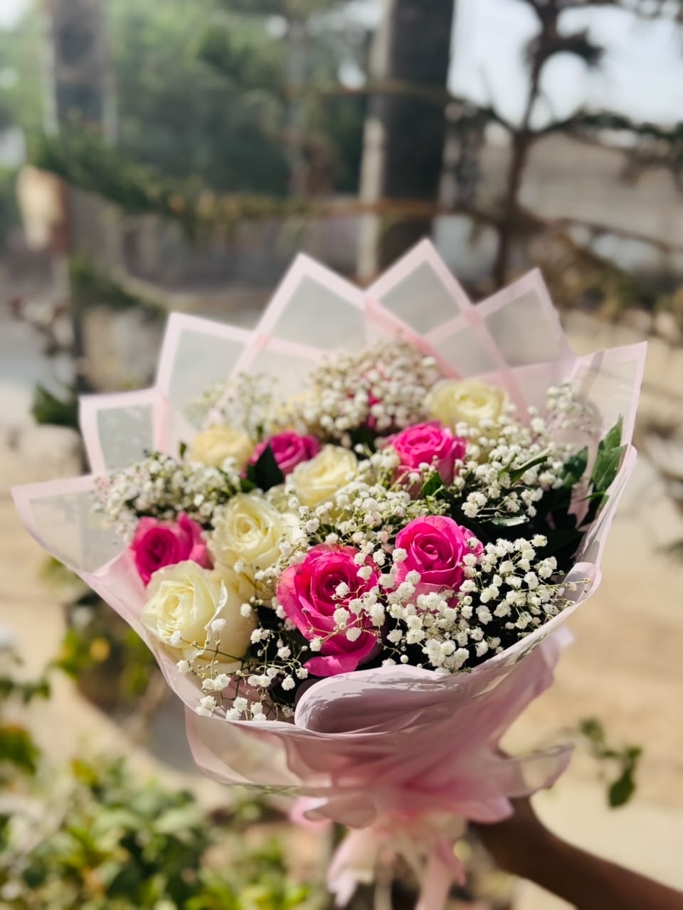 Love in Bloom bouquet with 10 imported roses and Baby’s Breath