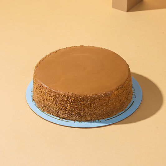 Fresh Layers Lotus Three Milk Cake with creamy Lotus Biscoff topping available for online delivery in Lahore and Islamabad by Giftogram by Samana.