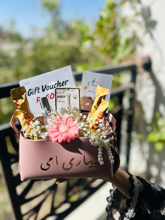 Mother’s Day gift pouch with jewelry chocolates and floral arrangement for mom in Pakistan