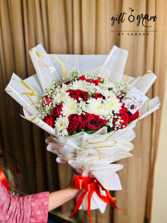Red roses and white daisies luxury flower bouquet